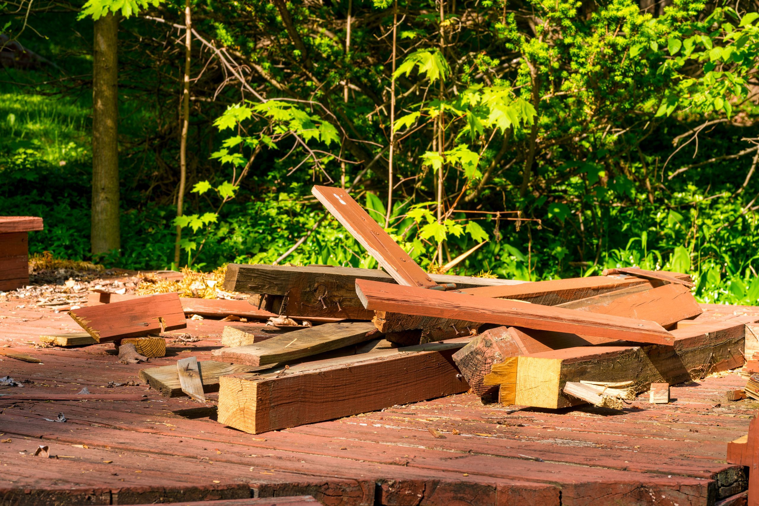 Are there any safety precautions I should take during deck demolition? faq - The Junk Guys