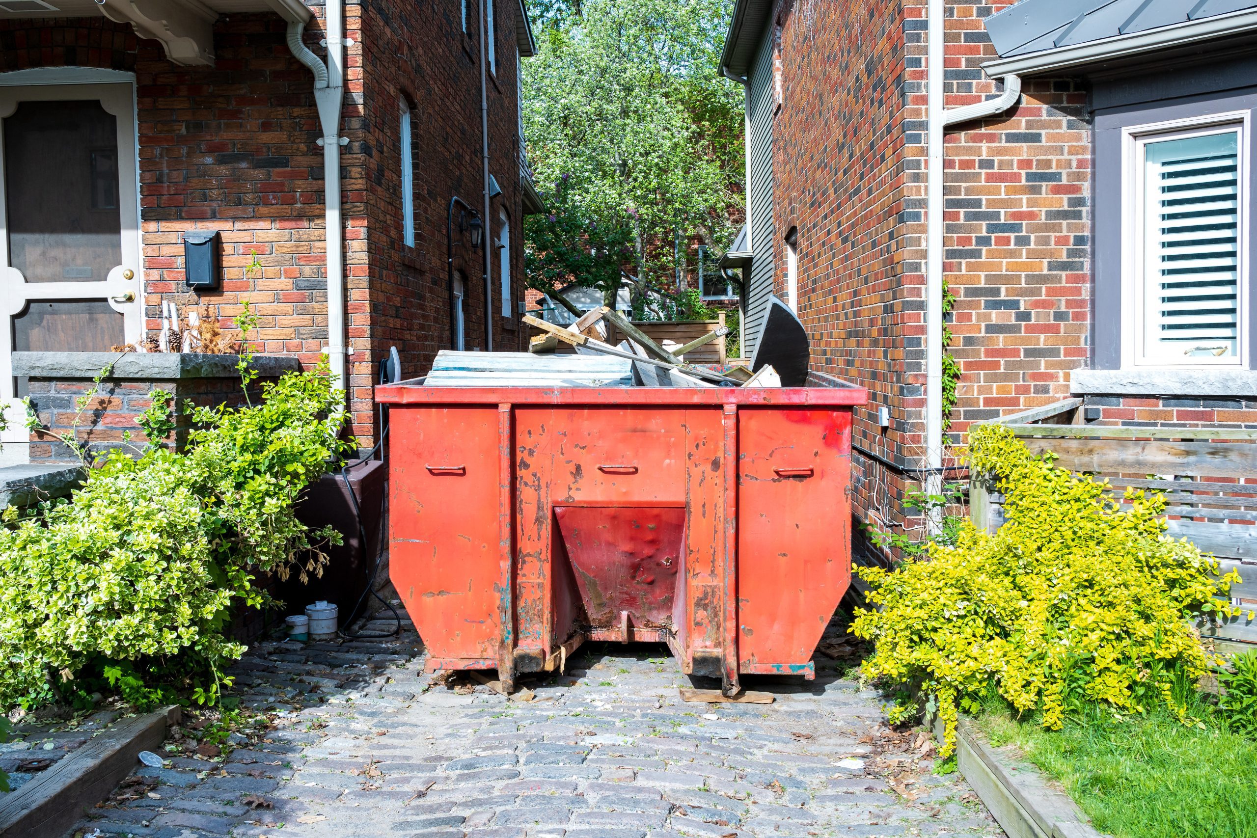 What areas does The Junk Guys serve for spring cleaning junk removal? - faq - The Junk Guys