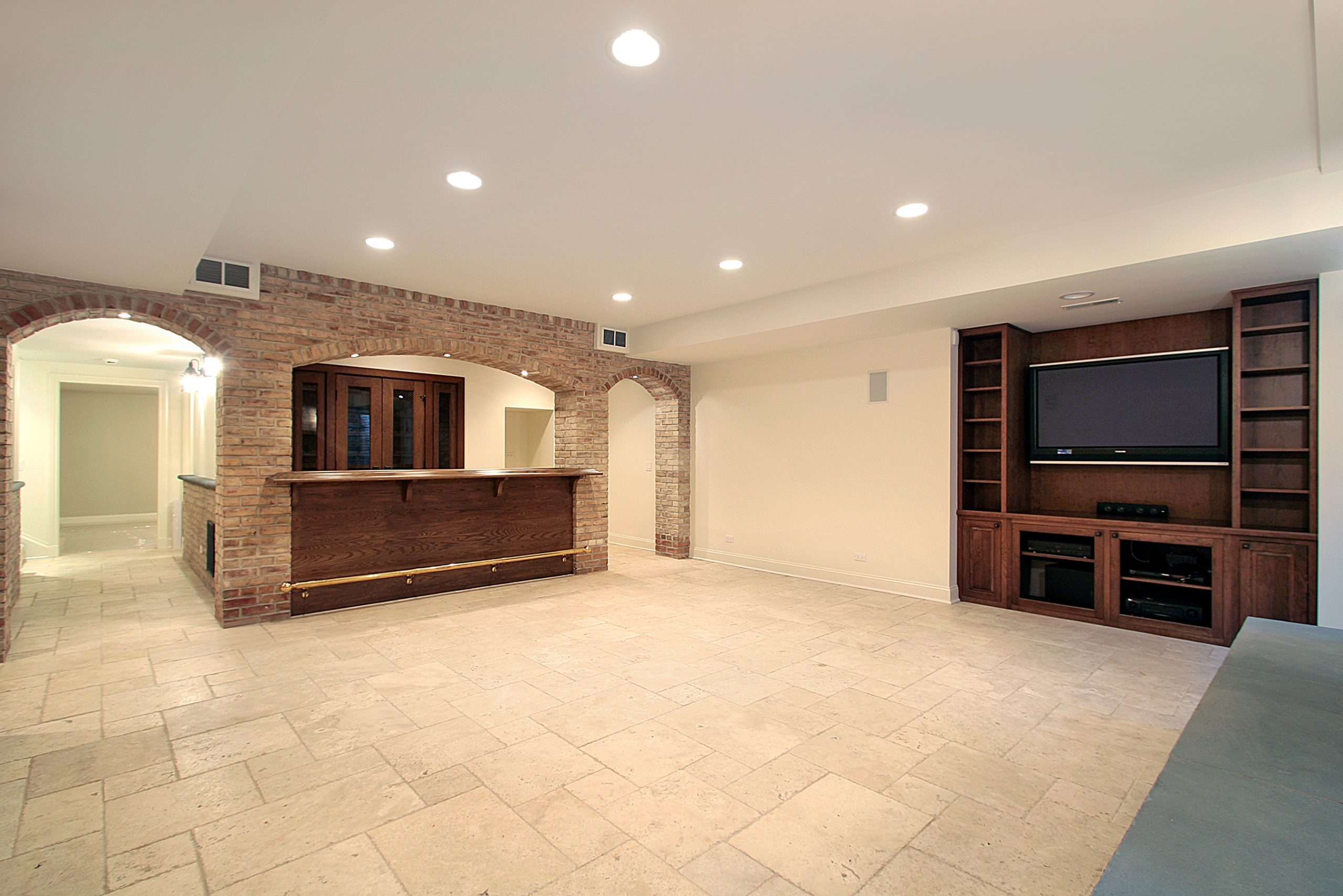 What is the first thing to do when finishing a basement?